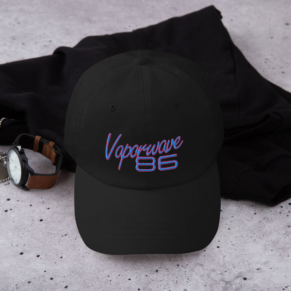 Retro Futurism 80s Vaporwave Baseball Cap. This is our classic 80's Outrun-Style Vaporwave Hat with adjustable strap and curved visor. This low profile street-wear emulates the 1980s retro futurism and is the ideal street style staple to your wardrobe. Great gift for Synthwave, Vaporwave, Retrowave, Cyberpunk and fans of the Synth-style. 